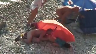 Real swingers at a nudist beach